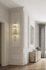 Modern Gold Wall Sconce with Tiered Crystal Rods, Perfect for Sleek And Elegant Lighting Solutions