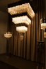 Sleek Gold And Crystal Chandelier with Square Layers for Modern Elegance in Home Lighting