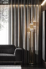 Sleek Multi-Arm Floor Lamp with Gold Accents And Clear Glass Tubes for Contemporary Home Lighting