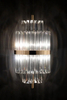 Contemporary Clear Crystal Wall Sconce with Gold Accent Bands, Ideal for Enhancing Modern And Luxurious Decor
