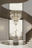 Contemporary Multi-Tiered Chandelier with Gold Accents And Clear Glass Tubes for Luxurious Home Lighting