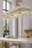 Elegant Gold And Crystal Pendant Light with Modern Layered Design, Ideal for Enhancing Style And Luxury in Dining Rooms And Contemporary Spaces