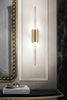 Minimalist Vertical Glass Tube Wall Sconce with Brass Fixture – Sleek Modern Lighting for Hallways and Bedrooms
