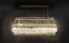Modern Gold and Crystal Linear Pendant Light with Chic Textured Design, Ideal for Brightening Up Dining Areas and Contemporary Interiors