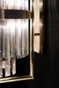 Contemporary Clear Crystal Wall Sconce with Gold Accent Bands, Ideal for Enhancing Modern And Luxurious Decor